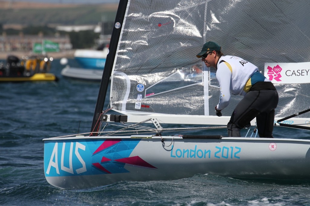 July 29, 2012  Finn class  Race 1 - Casey suffers deck damage &copy; Richard Gladwell www.photosport.co.nz